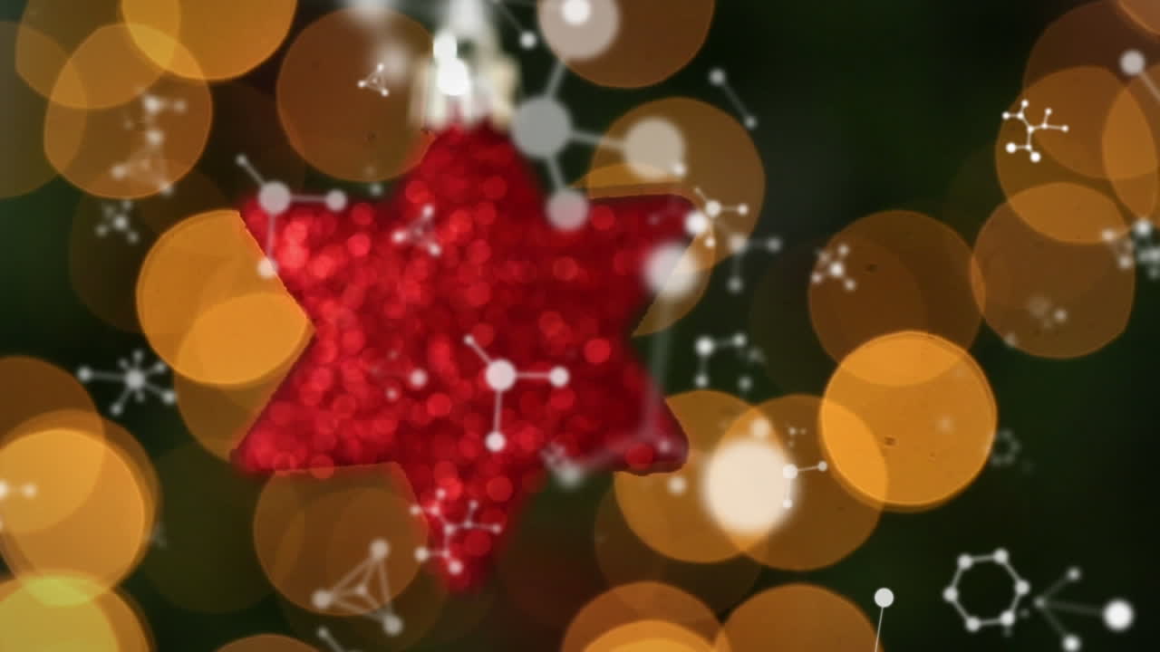 animación de redes flotando sobre la decoración del árbol de navidad de la estrella roja, con luces bokeh detrás