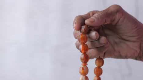 close up of senior women hand praying for ramadan