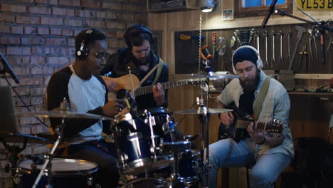 band rehearsing in a home studio