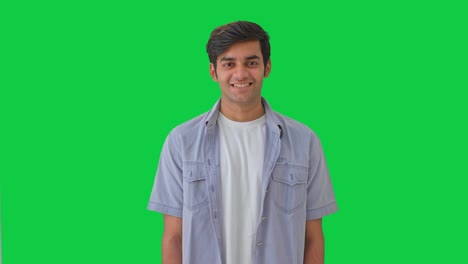 Happy-young-Indian-boy-smiling-Green-screen