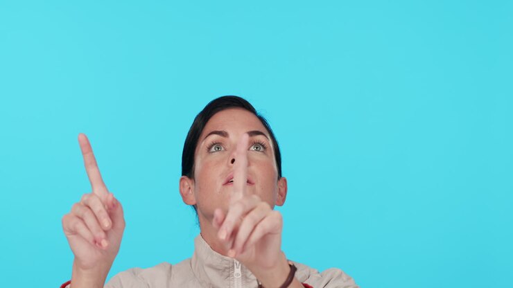 Pointing, space and choice with face of woman