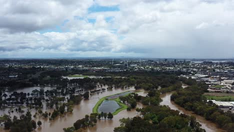 aerial barwon river water breaking its banks after damaging storms
