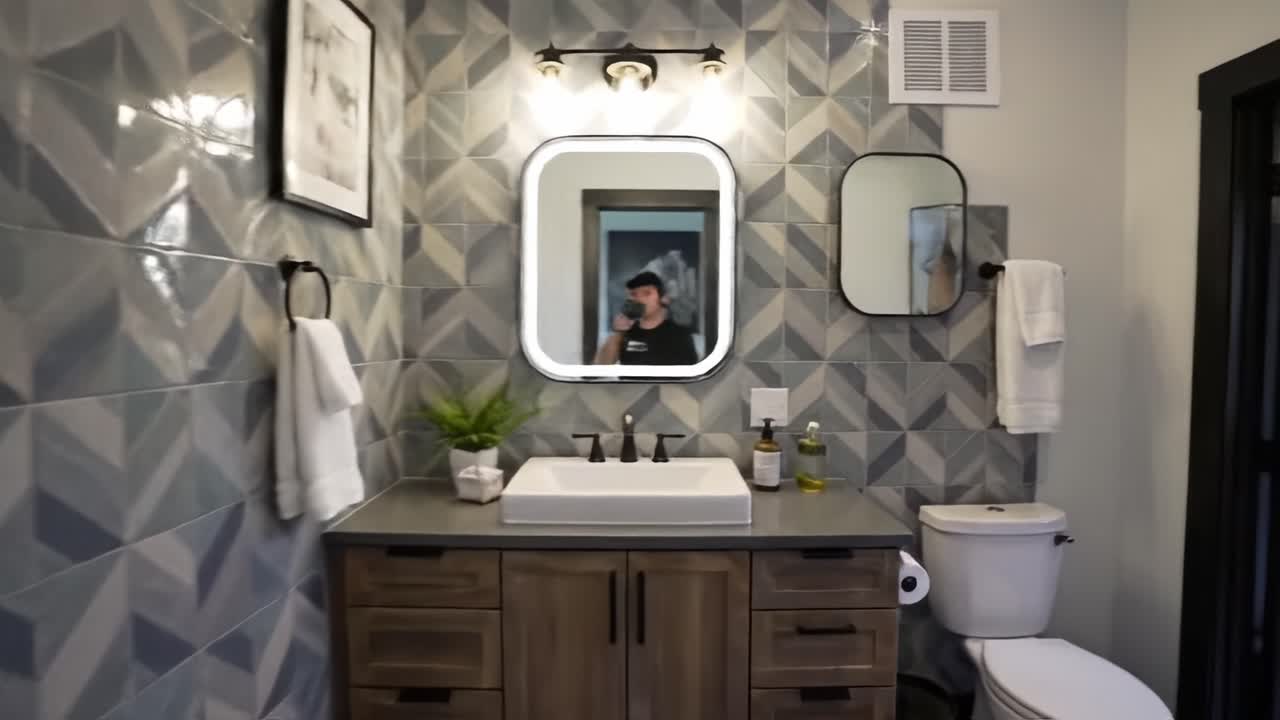 A Modern Bathroom Design Showcasing Elegant Fixtures, Stylish Decor, and a Functional Layout with Natural Light Enhancing the Space