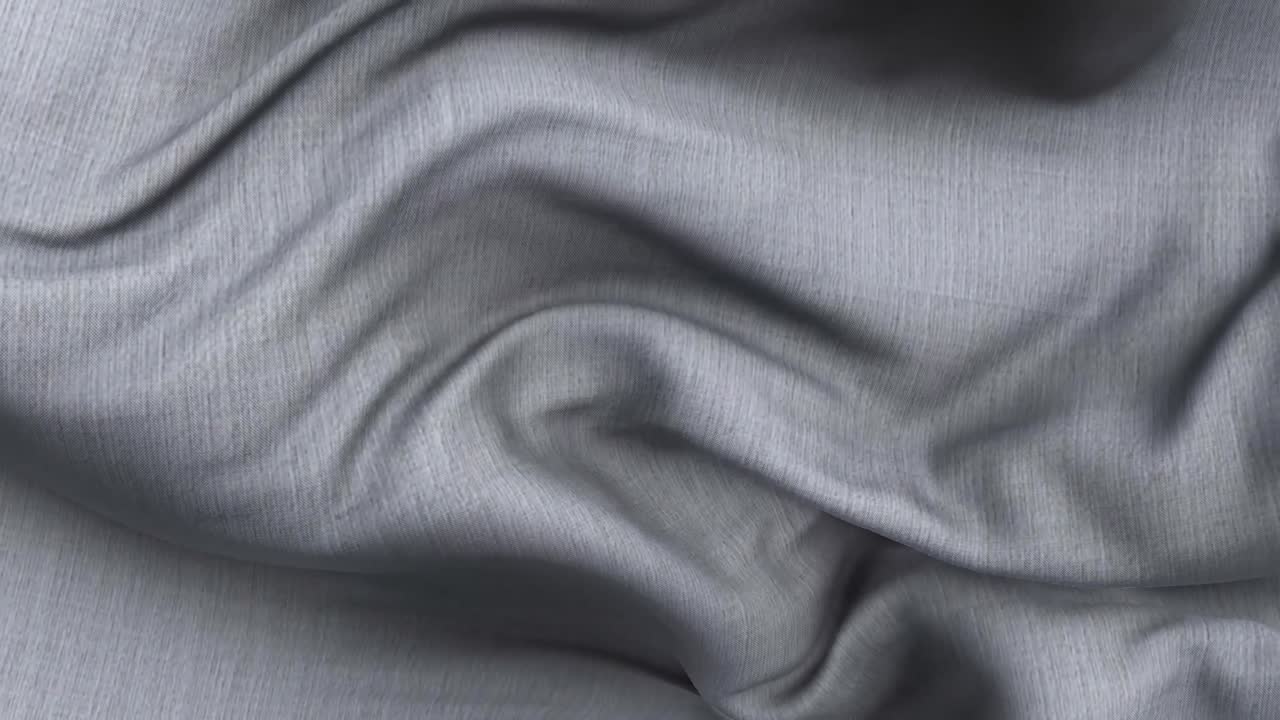 Tessuto grigio astratto con pieghe delicate e increspature