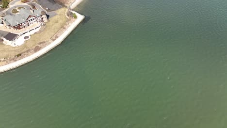 A-top-down-drone-view,-directly-above-the-Great-Bay-in-Bay-Shore,-NY-on-a-sunny-day