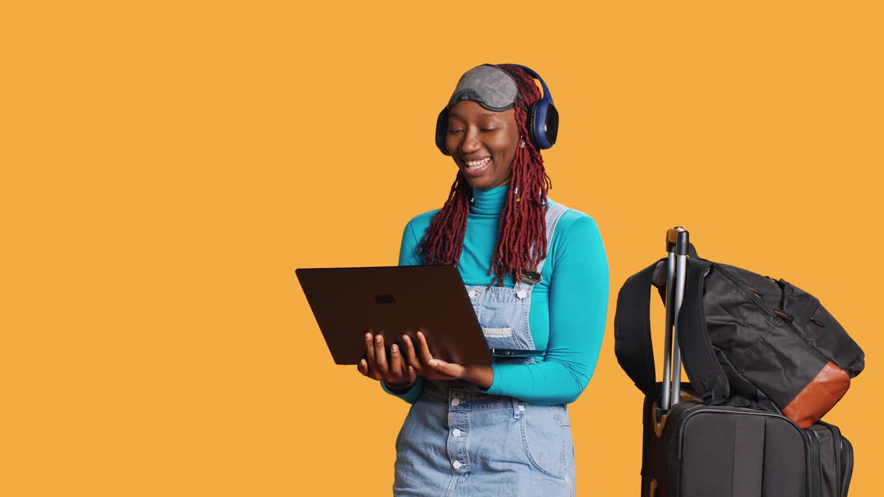 Young woman watching movie on laptop