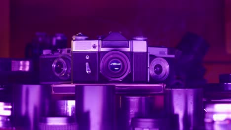 Vintage Cameras in Purple Light