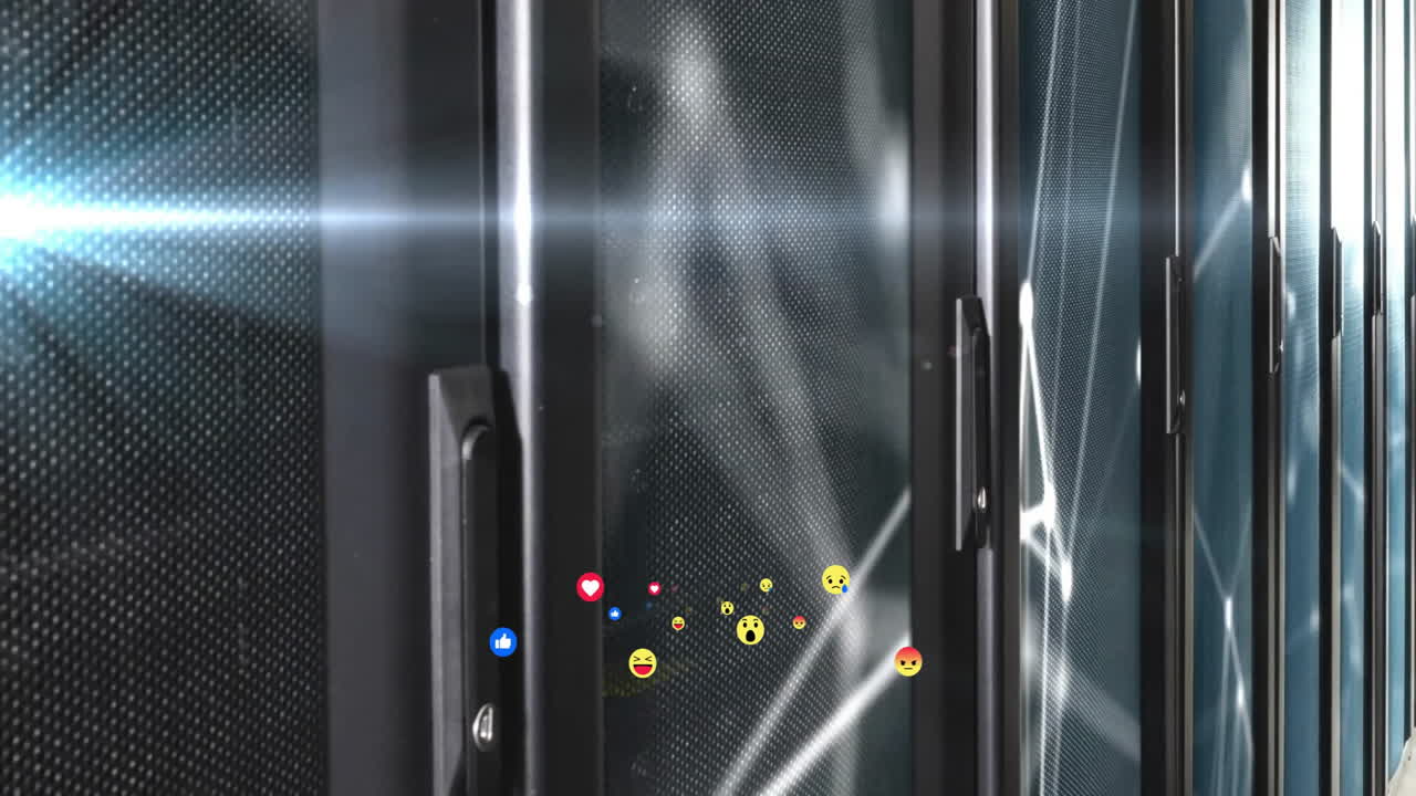Animation of social media reactions floating in front of server racks in data center