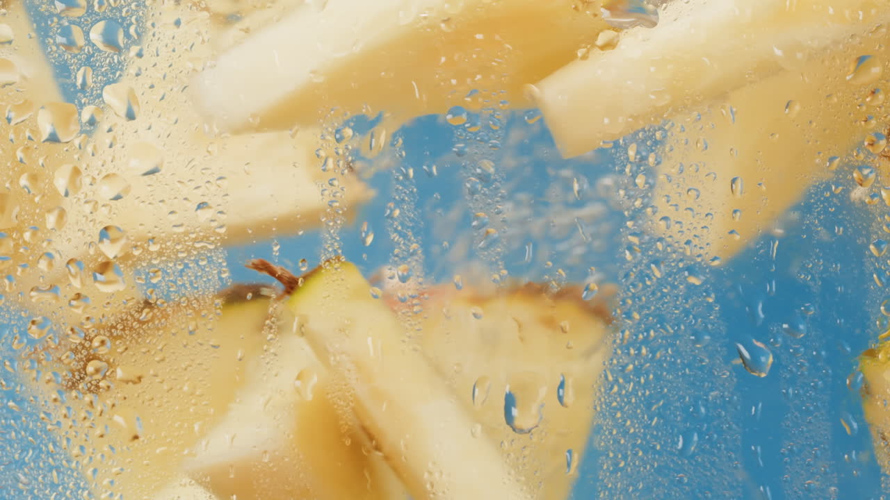 Close-up of Sliced Pears with Water Droplets