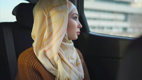 muslim woman in car