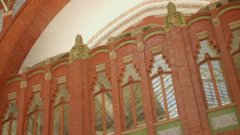 Interior-details-of-Colón-Market,-historic-landmark-architecture-in-Valencia,-Spain