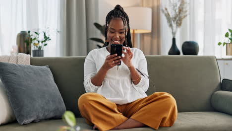 Home,-funny-and-black-woman-on-a-sofa