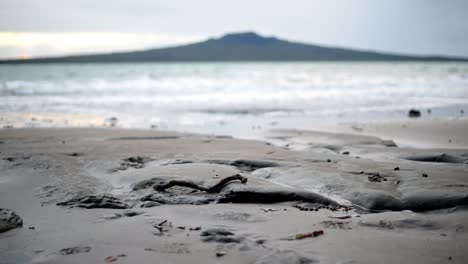 Low-shot-of-the-waves-crashing-in-with