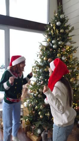 two women celebrating christmas