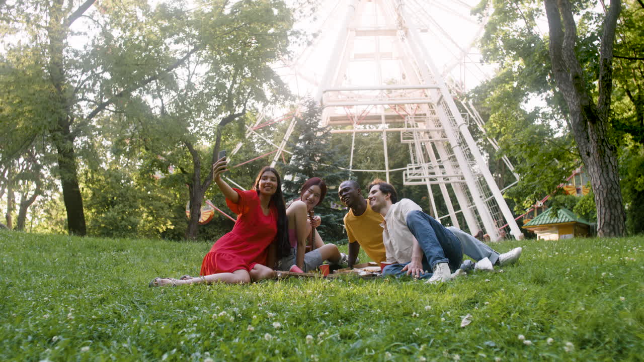Four people taking photos