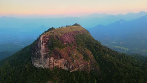 evening aerial shot of bible rock in sri lanka