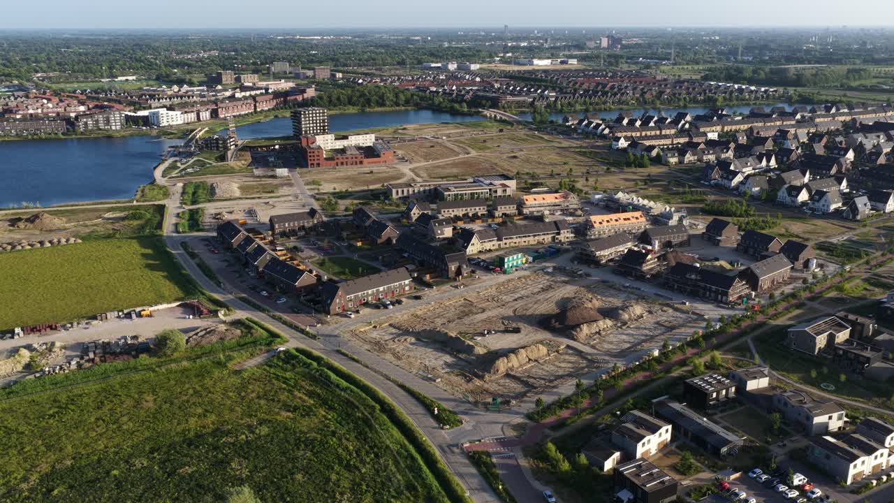 housing shortage in The Netherlands, new build housing, residential areas. real estate. Aerial video