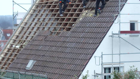 wide shot of partially deconstructed old roof