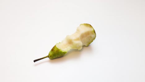 Pear-eaten-in-stop-motion-animation-by-bite-at-a-time-on-white-background