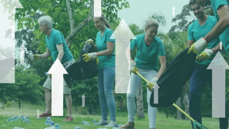 animation of flying arrows over happy diverse group cleaning up rubbish in countryside