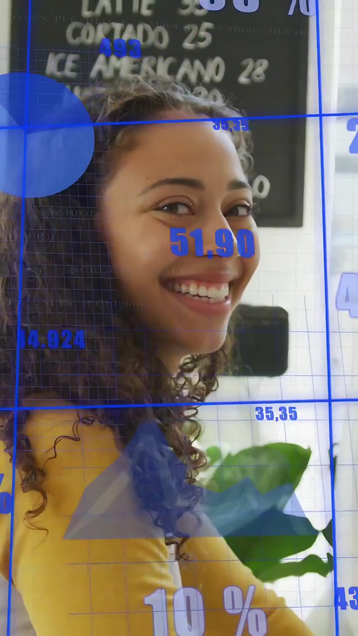 Vertical video: Woman in cafe turning to offscreen cue, laughing while blue data tracking face tech