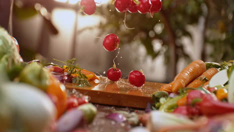 vegetables splashing on cutting board