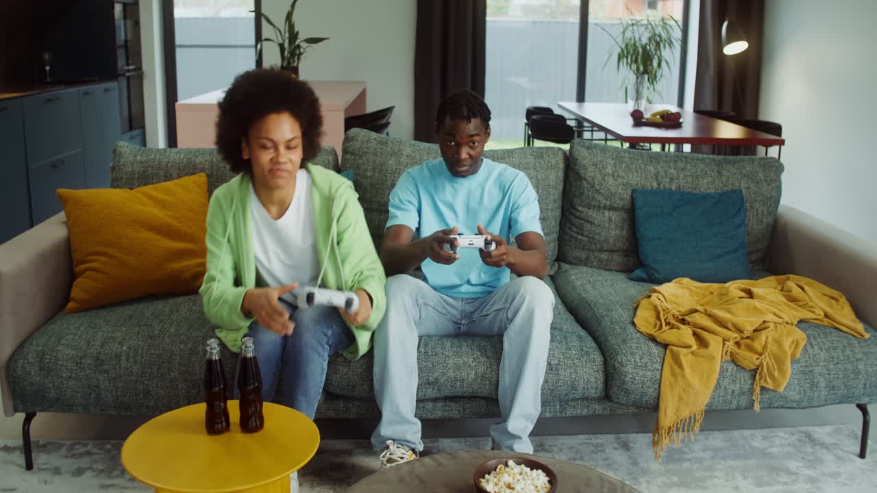 Couple Enjoying Video Games at Home