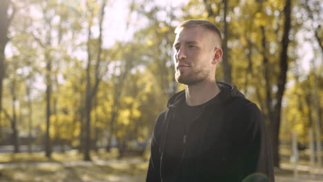 man in park in autumn