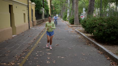 woman running in urban park