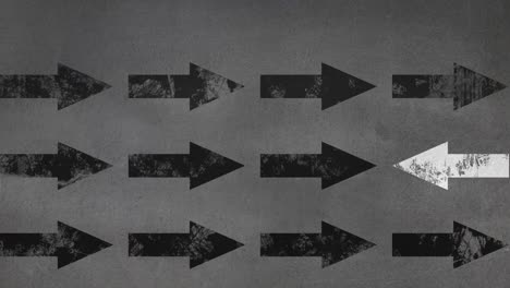 Digital-animation-of-multiple-black-and-white-arrows-moving-against-grey-background