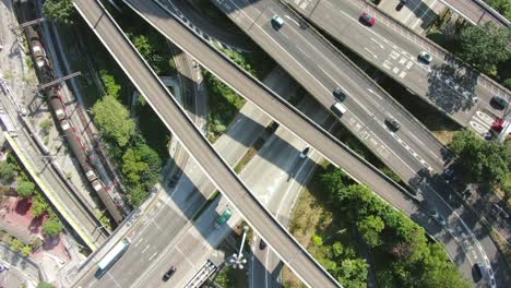 Massive-Highway-interchange-with-traffic-on-all-levels-in-downtown-Hong-Kong,-Aerial-view