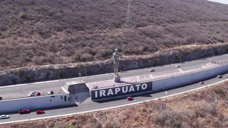 aerial shot of the statue of the steel giant in irapuato