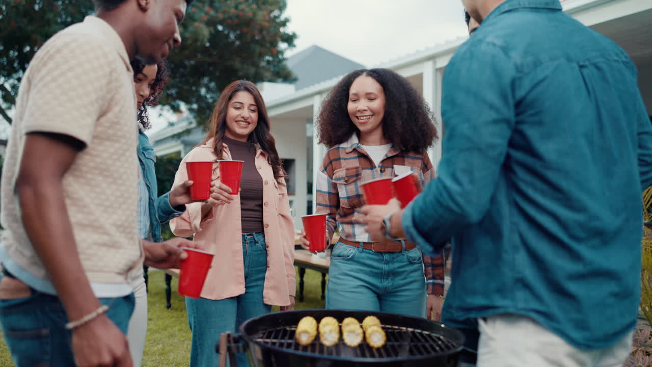 Group of young adults celebrating with red cups