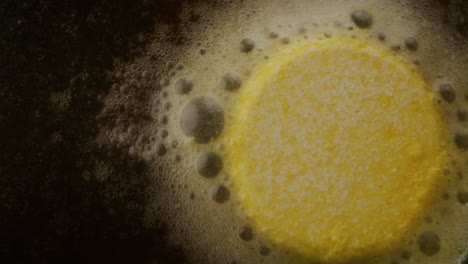 bath bomb dissolving in water