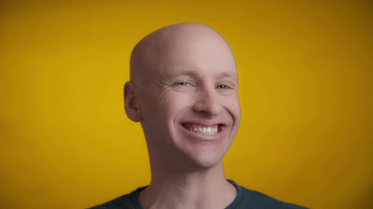 Man grins with confidence