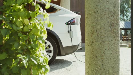 white ev charging at home