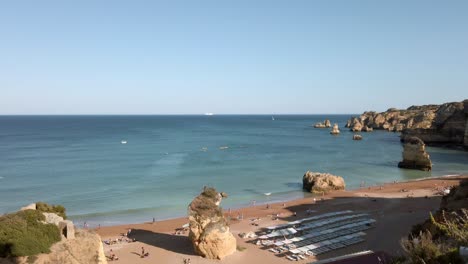 looking over praia dona ana beach and beautiful sea in lagos, portugal