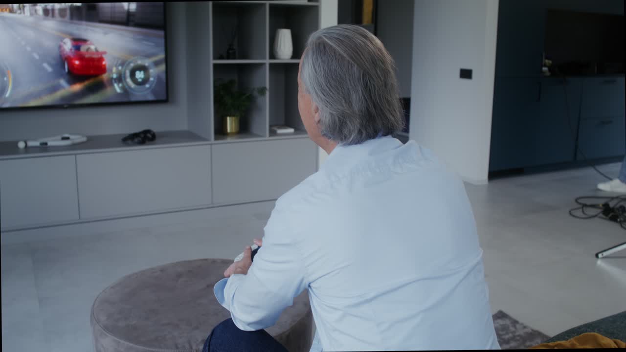 Man Watching TV in Living Room