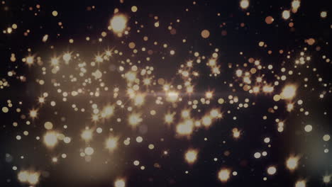 animación de estrellas y manchas amarillas brillantes sobre fondo negro