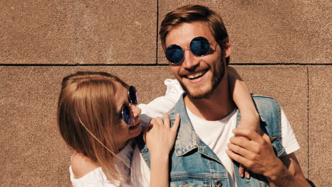 couple posing outdoors