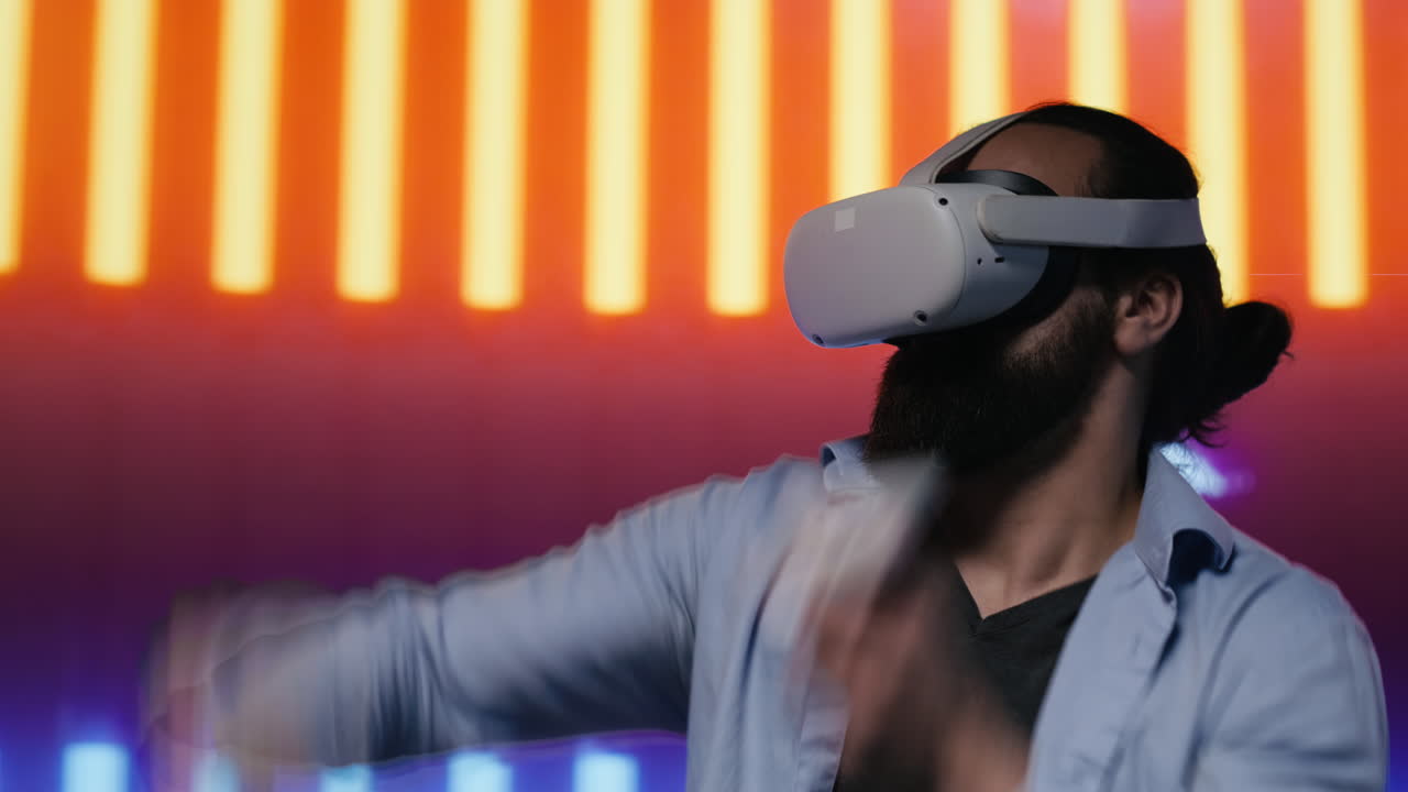 Modern man in a neon lit night scene using VR high tech glasses