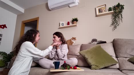 people and cats celebrating in living room