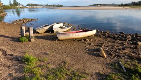 time-lapse of a boat on a peaceful lakeshore