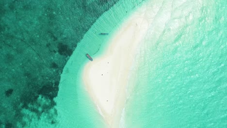 A-Bird'Seyeview-Shows-Boats-And-Tourists-Enjoying-Snake-Island-Indonesia