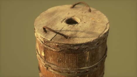 Old-used-rusted-wooden-bucket