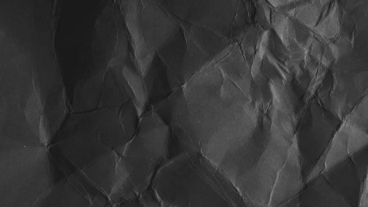 Crumpled Black Paper Texture Background