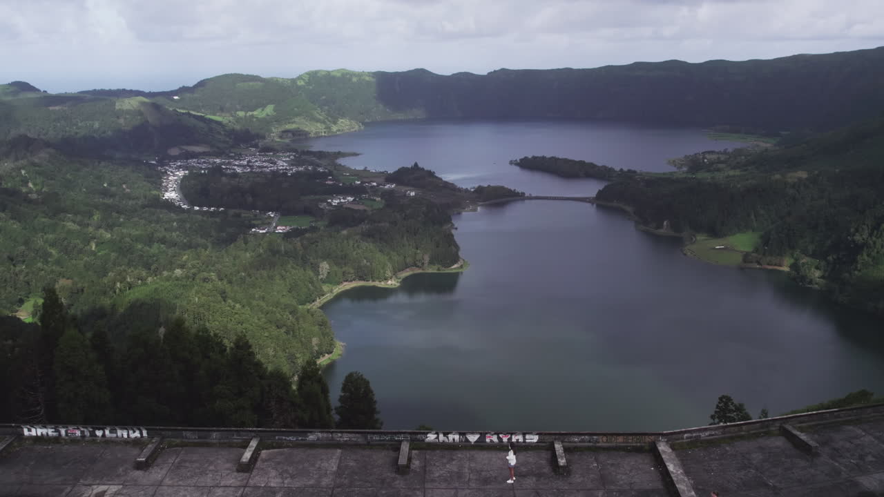 Tourist atop Monte Palace overlooking S&atilde;o Miguel's lagoon, Azores