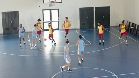 competing intensely, basketball players focusing on teamwork and strategy on court