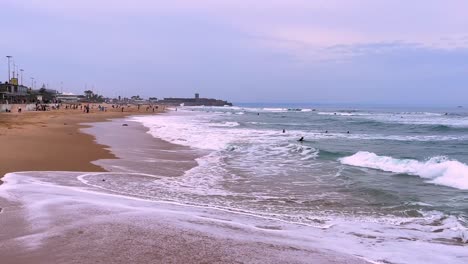 scenes of surfers from all over the world coming together to share their love for the sport and the ocean at carcavelos