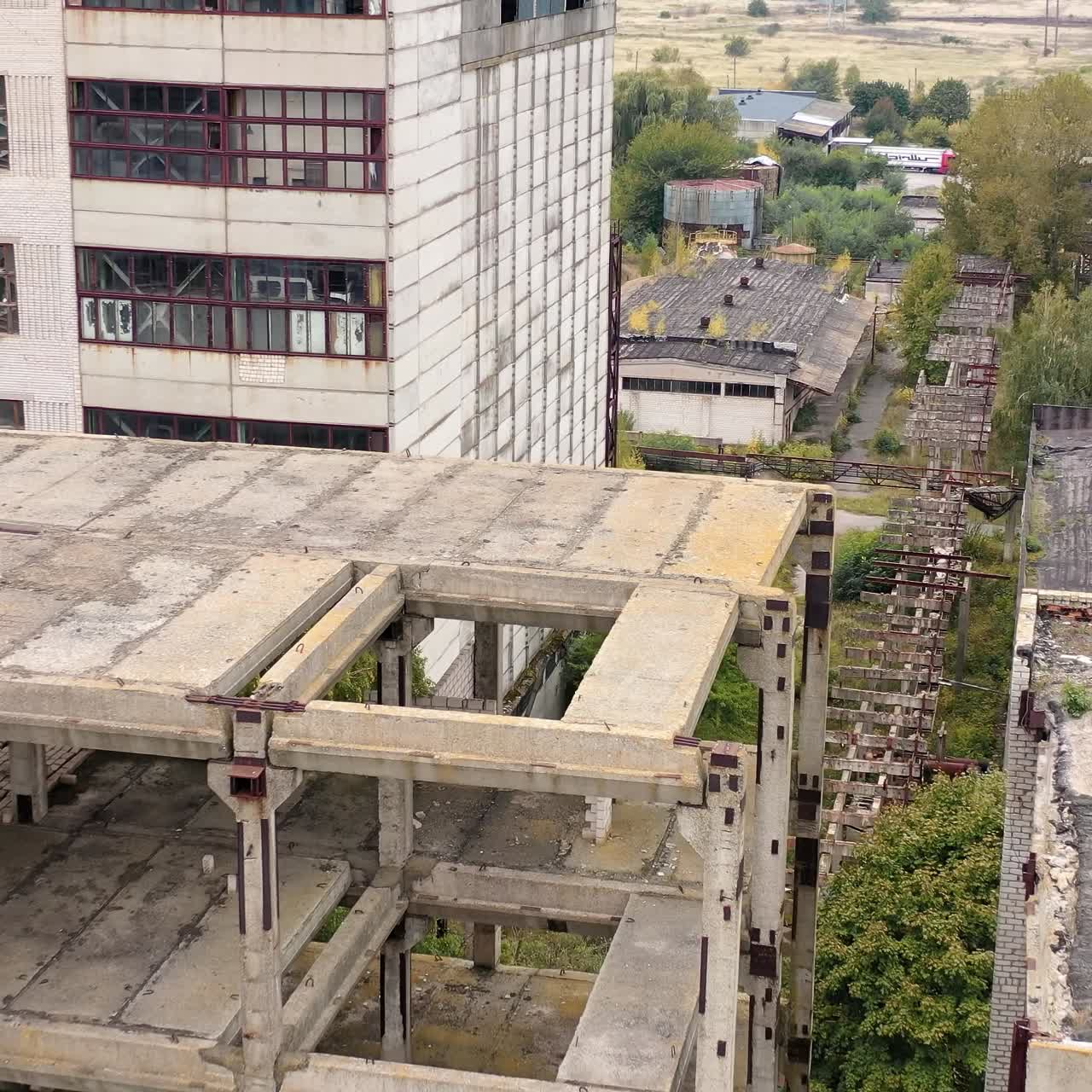 Industrial destroyed city buildings. Abandoned ruined factory building architecture